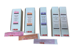 Three white numbered boxes of epinephrine labeled for children with varying dosage amounts along with two boxes of 4ml endotracheal epinephrine syringes.